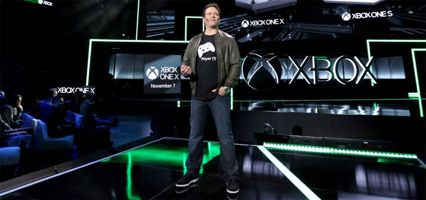 Phil Spencer speaking on stage at a Microsoft E3 Press Conference